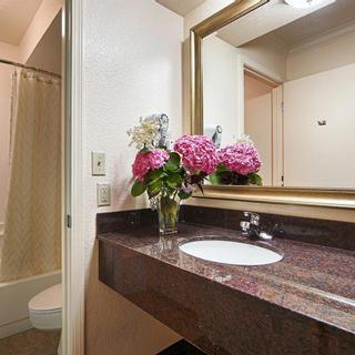 Best Western Danville Sycamore Inn | Danville, California | Hotel bathroom with flowers